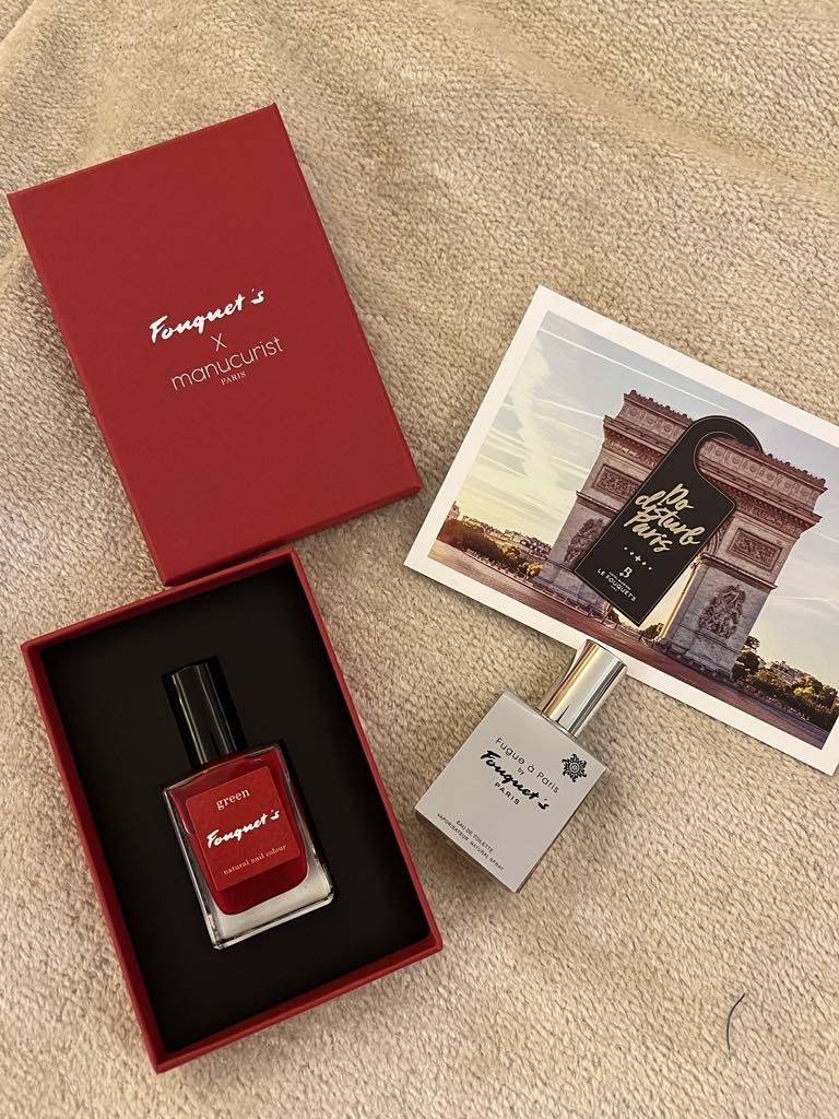 Chic red nail polish branded by Le Fouquet’s Paris, offering a touch of Parisian glamour as a luxurious beauty detail or guest gift
