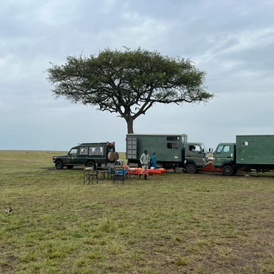 Elegant bush lunch experience at Cottar’s 1920s Safari Camp in Kenya, with gourmet dining set in the African wilderness during a luxury family safari.