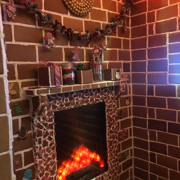Holiday-themed Gingerbread Express elevator at Trump Hotel Chicago, featuring real gingerbread construction and festive décor for a magical family Christmas experience.