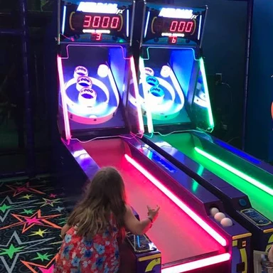 Family-friendly video game lounge at Grand Moon Palace Cancun, offering teens and kids interactive entertainment at a luxury all-inclusive resort in Mexico.