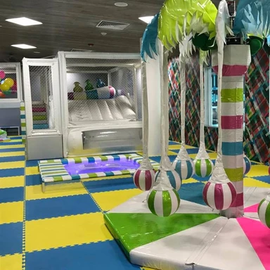 Family-friendly video game lounge at Grand Moon Palace Cancun, offering teens and kids interactive entertainment at a luxury all-inclusive resort in Mexico.