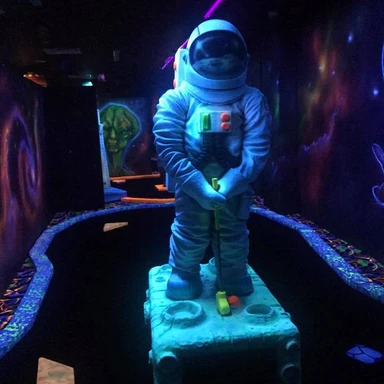 Family-friendly mini golf course at Grand Moon Palace Cancun, offering fun outdoor activities for kids and teens at a luxury all-inclusive resort in Mexico.

