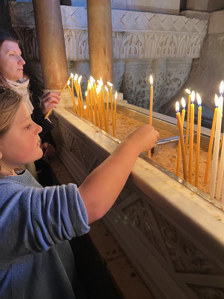 teen girl harper lighting candles