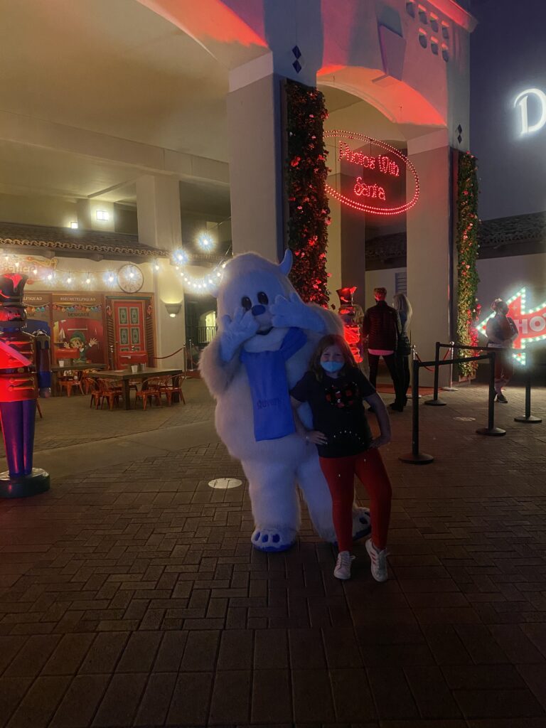 kid traveler Harper meeting the festive Yeti character at the Fairmont Scottsdale Princess during the magical “Christmas at the Princess” holiday celebration.