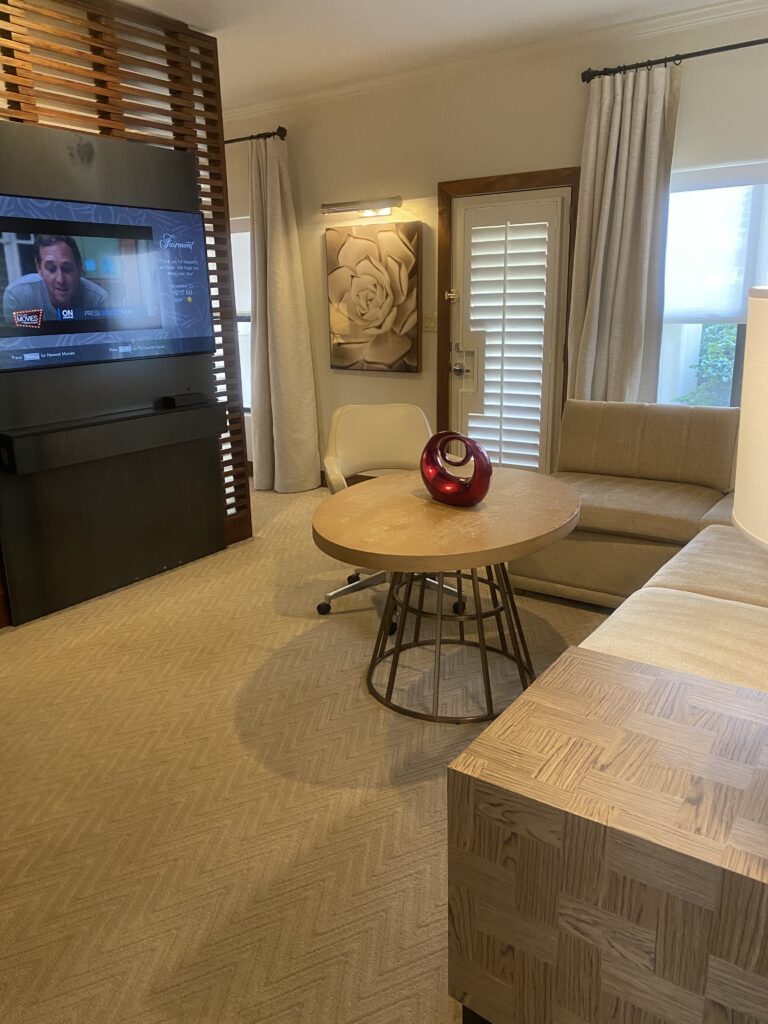 Luxurious two-bedroom suite at a high-end family hotel, offering spacious accommodations with upscale furnishings, private bedrooms, and a comfortable living space—perfect for multi-generational travel or extended stays.