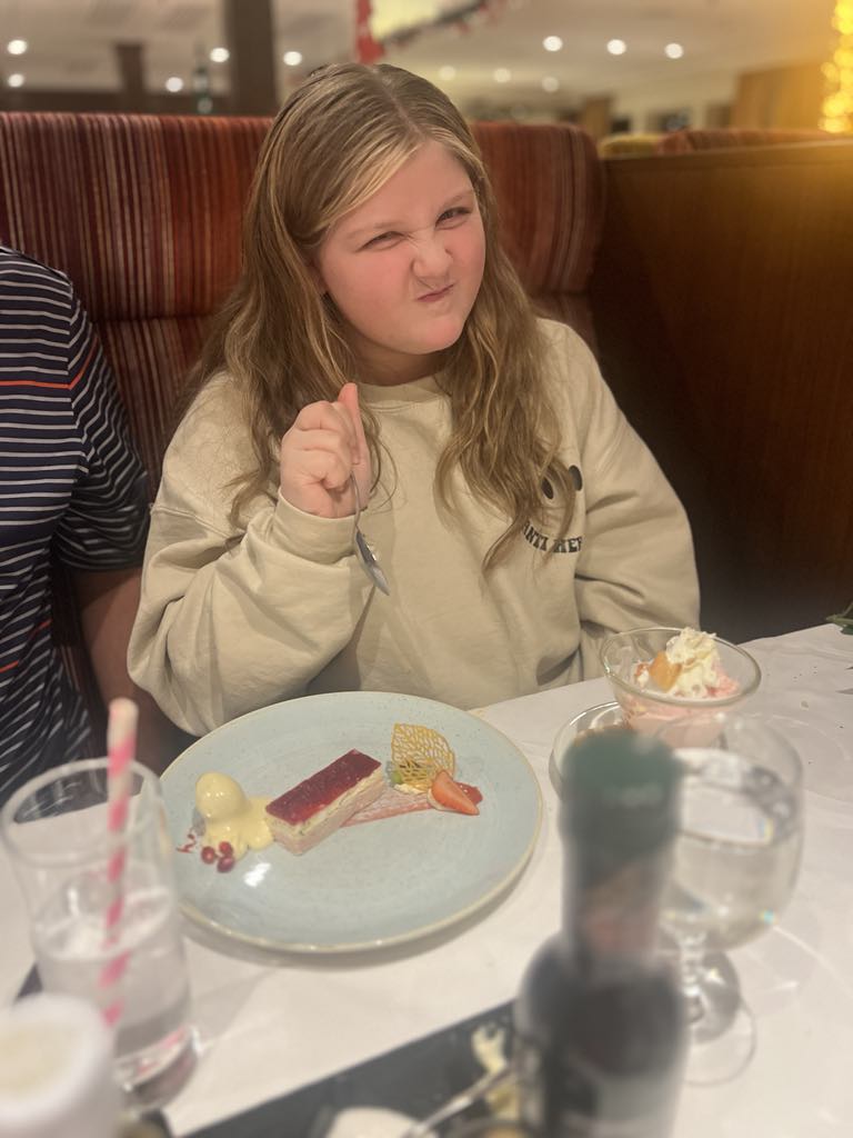 Harper enjoying food on board Amabella