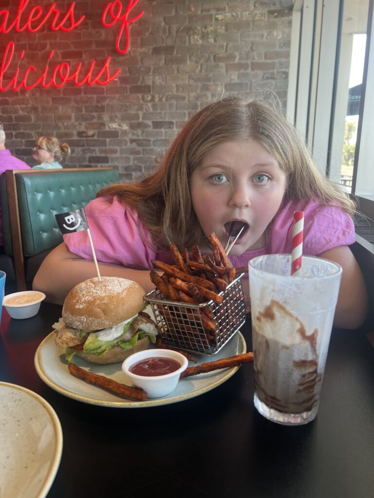 Harper with Burger from Burger Urge
