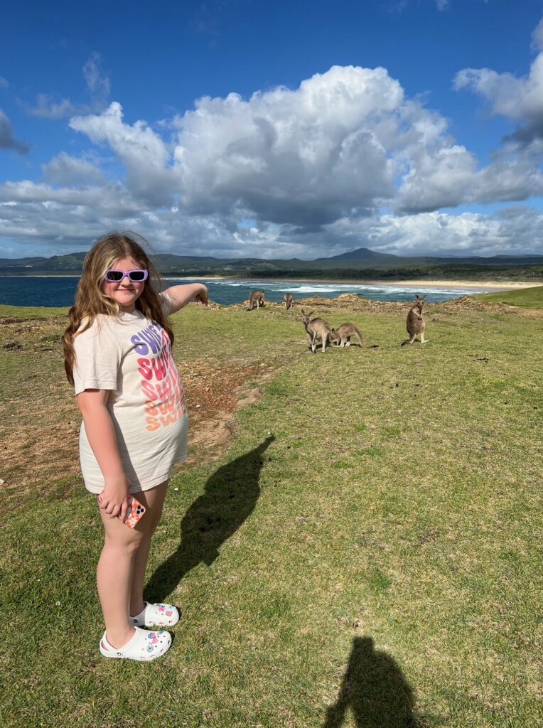 Girl pointing to Kangaroos
