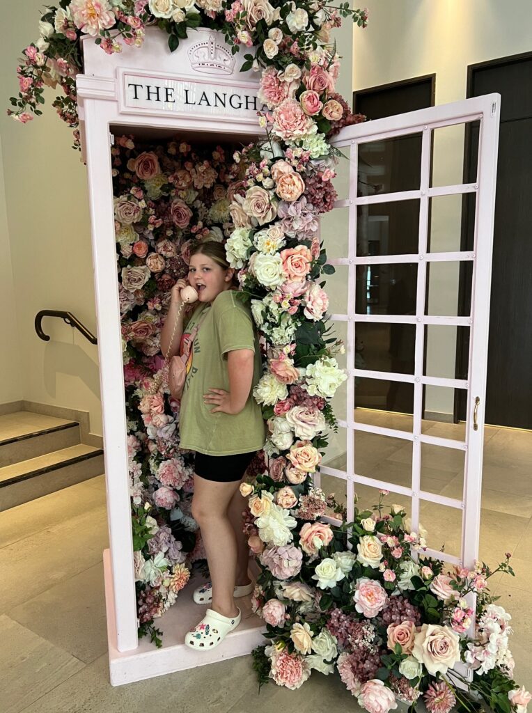 Girl in decorated phone booth