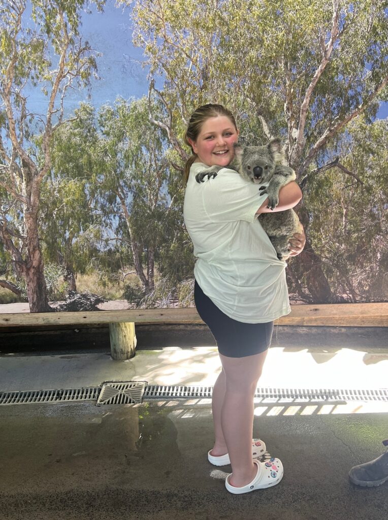 Harper holding a koala